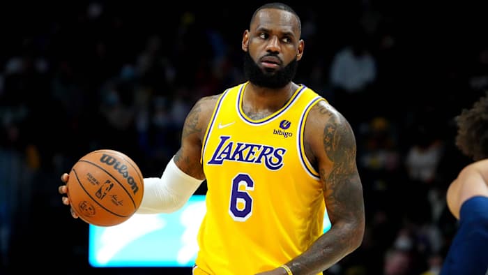 Los Angeles Lakers forward LeBron James (6) dribbles the ball in the second half against the Denver Nuggets at Ball Arena.